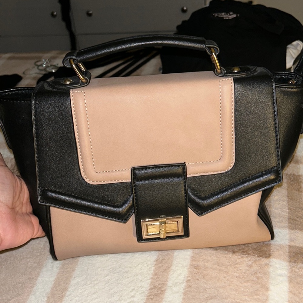 Nude and black hand bag